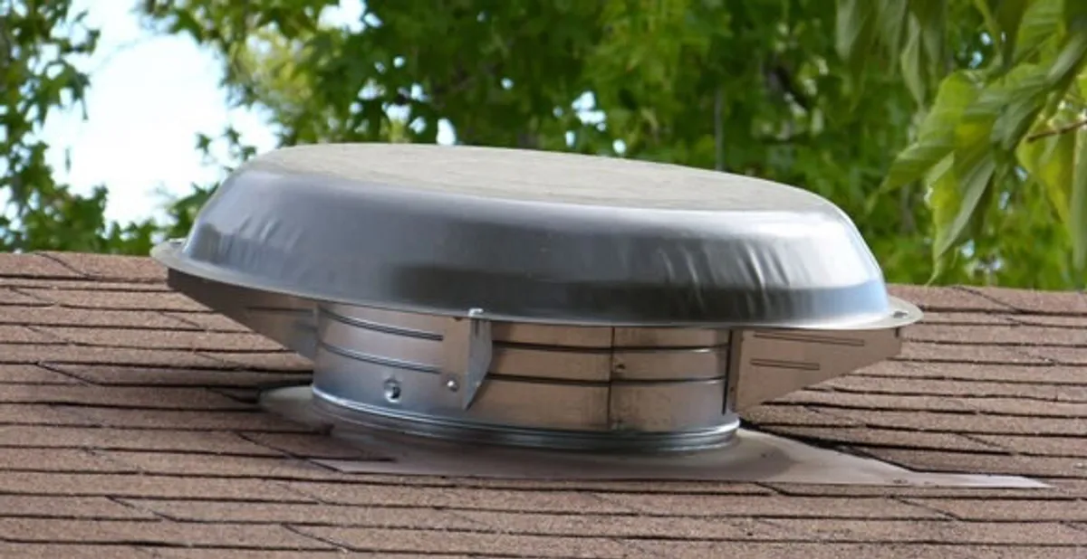 attic fan installation services with low-profile roof ventilation unit in Staten Island, NY