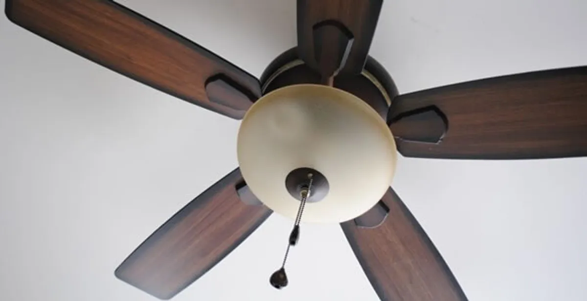 Fully installed ceiling fan with balanced blades and light fixture in Staten Island, NY