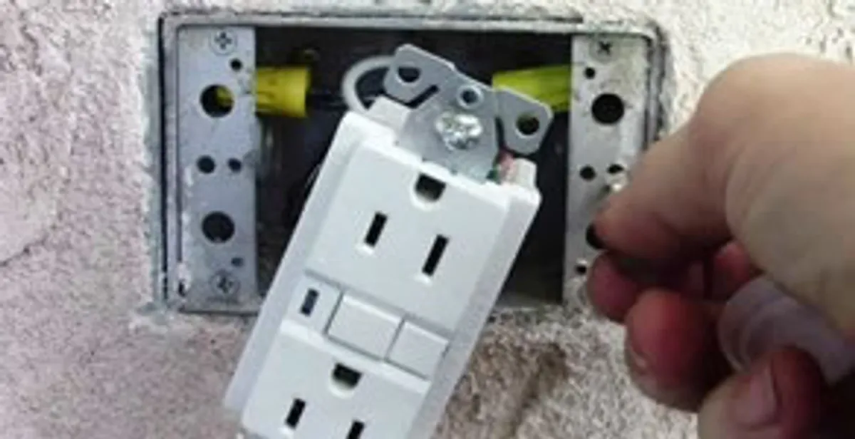 gfci circuits service showing installation of a ground fault circuit interrupter outlet by licensed electricians in Staten Island, NY