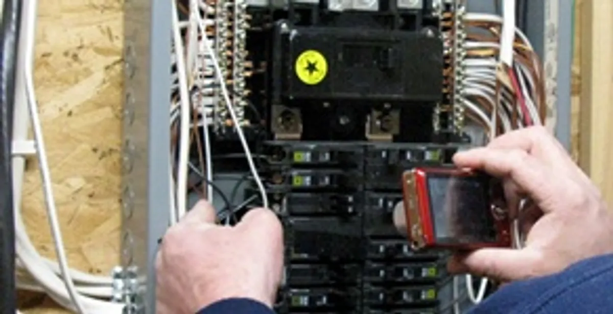 Home electrical inspection of circuit breaker panel by licensed electrician in Staten Island, NY