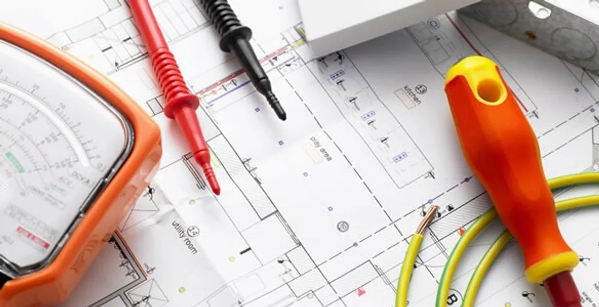 licensed electrician planning and testing electrical systems using professional tools in Staten Island, NY
