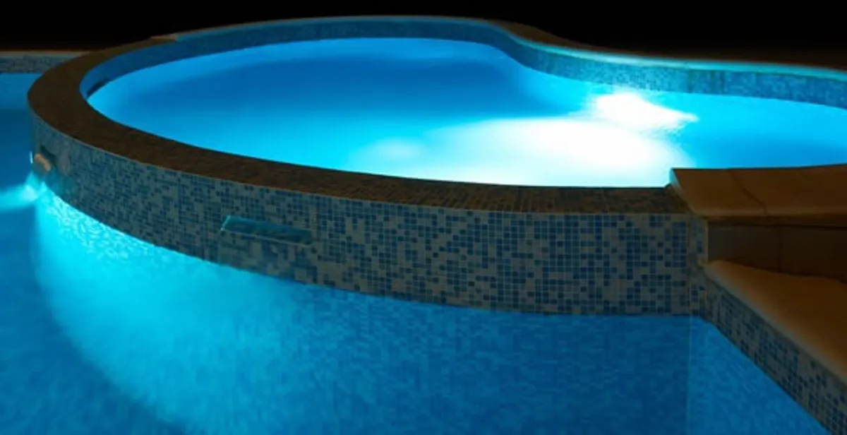 pool light installation and repair services highlighting illuminated pool interior lighting in Staten Island, NY