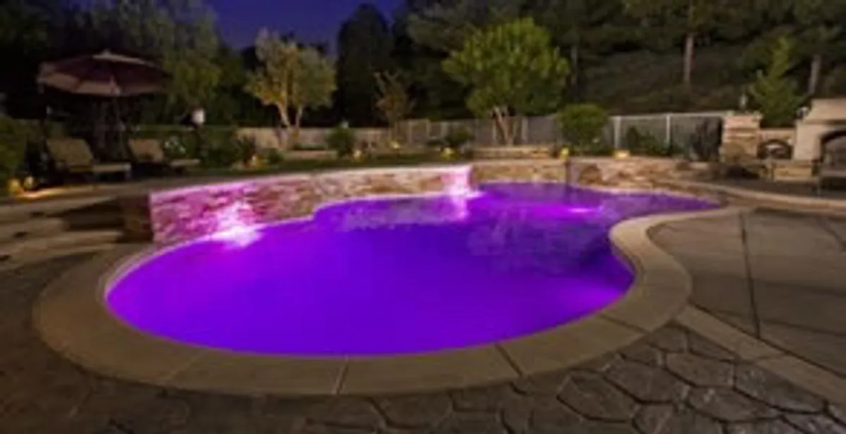 pool light installation and repair services illuminating a residential swimming pool in Staten Island, NY