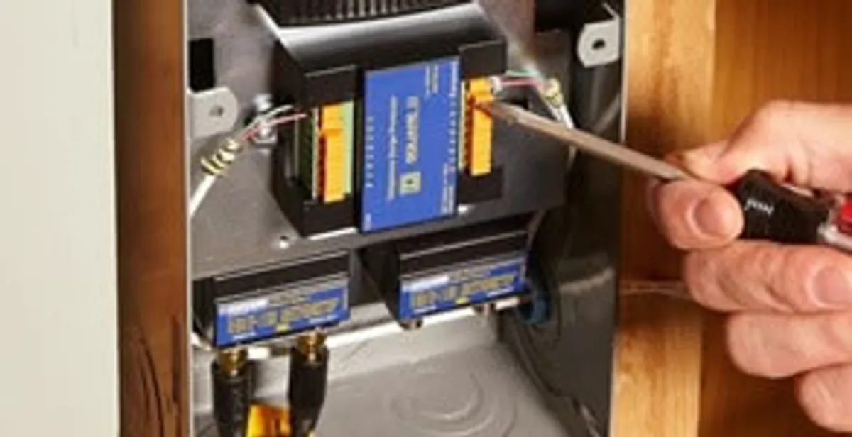 Whole home surge protection device being installed by a licensed electrician to protect electrical systems in Staten Island, NY